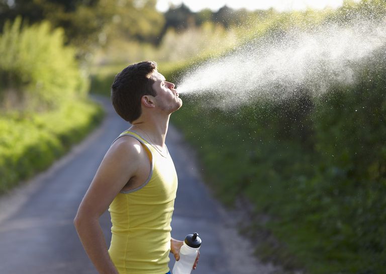 young-runner-spitting-out-water-royalty-free-image-88012162-1537466808