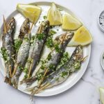 Cómo hacer sardinas al horno con ajo y perejil: paso a paso de una receta muy fácil