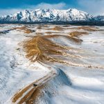 Fotos increíbles que muestran un ‘desierto’ en el sur de Siberia, cubierto de arena y nieve a la vez